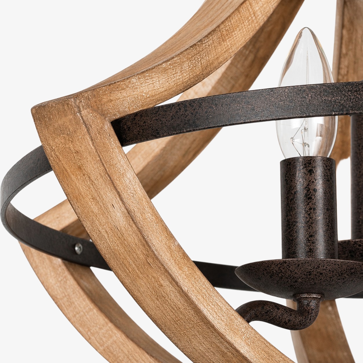 Distressed wood and rust-finished metal chandelier detail